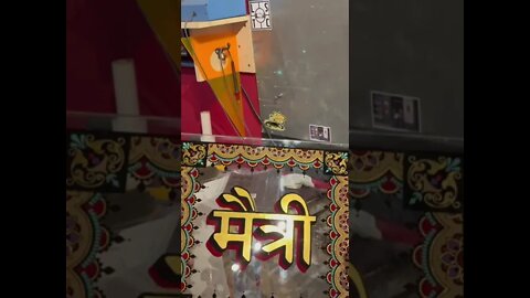 Sanskrit Maitri gold in glass