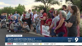 Anti-abortion group holds a rally outside of Planned Parenthood clinic in Tucson