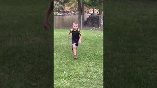 Boy and dog running