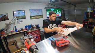 installing SDKA seat cover over Guts foam on the CR250R project bike.