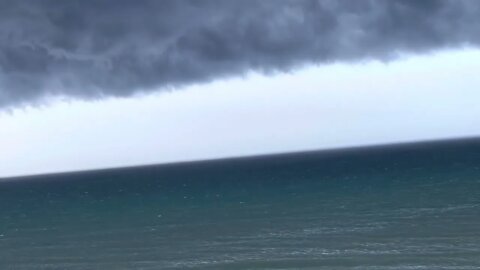 Indiatlantic beach thunderstorm rotation in clouds. Beautiful roll out