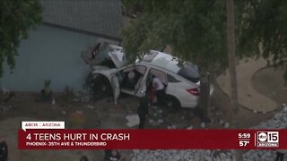 Four teens hospitalized after car crashes into a home
