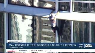 Man arrested after climbing building to end abortion