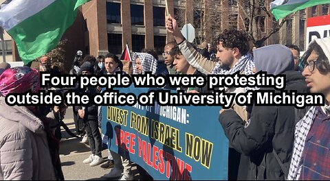 Four people who were protesting outside the office of University of Michigan