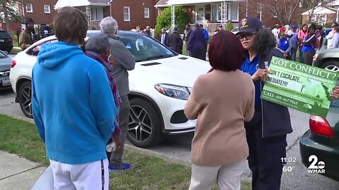 Neighbors join hands, pray in Northeast Baltimore after 3 killed in shooting