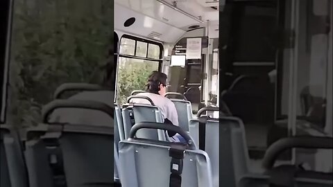 Man Babbles on City Bus