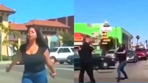 Officer Duels Woman In The Middle Of An Intersection