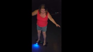 Woman Attempts To Ride Hoverboard, Wipes Out Immediately