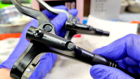 Leaking hydraulic brake on a bicycle. Replacing a Shimano MT-201 brake
