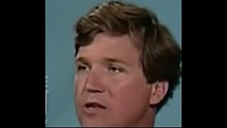 Young Tucker Carlson answers question from crowd