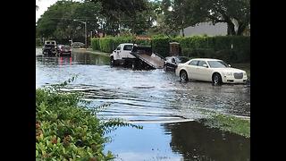 Who is responsible for flooded street?