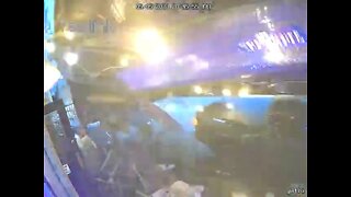 Surveillance video shows truck crashing into restaurant patio