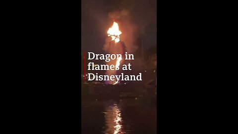 Fire-breathing dragon engulfed by flames at Disneyland show