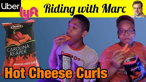 young couple eating HOT Carolina Reaper Cheese Curls