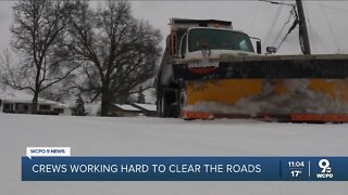 Crews continue working to clear roads as temps fall