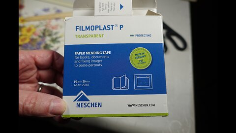 Using Filmoplast P to Repair Torn Pages