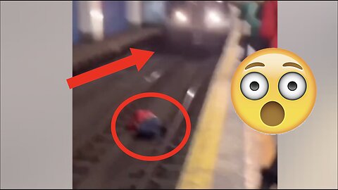 Train Comes Charging at Man Lying on Tracks