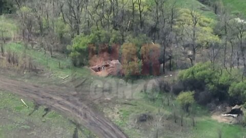 152 mm gun-howitzer M1955 (aka D-20) of the 'Somalia' battalion of DPR destroy blindage of 5 Ukrainian mortarmen near Avdeyevka hiding in a wood line under a masking net