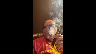 Cigar smoking slow mo.