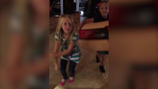 Two Adorable Tots Dance Together