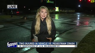 Two pedestrians struck by car