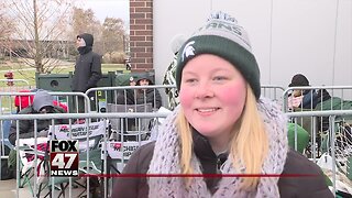 Fans wait outside of Breslin Center