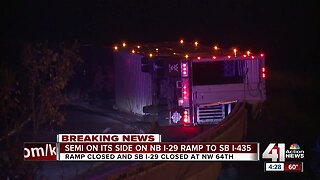 Tractor-trailer carrying cows overturns on the interstate