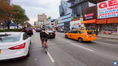 Bike Messenger Riding Fast and Fluid Through NYC Traffic