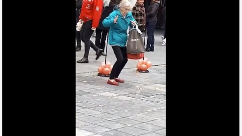 Elderly woman shows off her dance moves