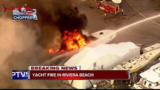 Crews battle flames after yacht engulfed by fire in Riviera Beach