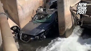 Car somehow crashes into water canal