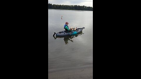 Dropping baits in a kayak