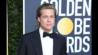 Brad Pitt and Andra Day 'swapping numbers at the Oscars'