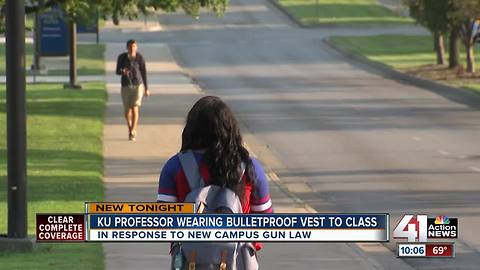 KU professor wears bullet proof vest as students now allowed to carry guns on campus