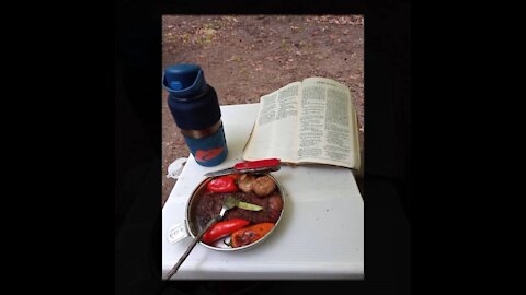 The Word and Food in front of a fire.