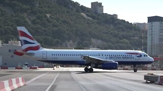 Plane Taxi on Road at Gibraltar Airport