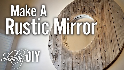 Make a rustic mirror from a wood spool