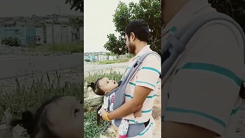 baby and papa walking