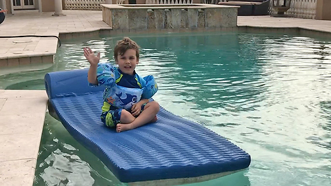 Happy Canadian Boy Goes Boating on a Floatie in Florida Pool