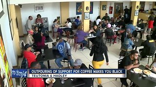 Community members showing support for coffee makes you black