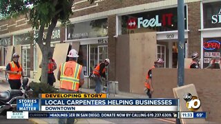 Carpenters volunteer to help San Diego owners protect businesses