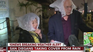 San Diegans taking cover from rain