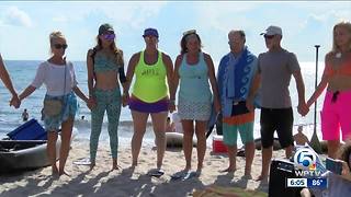 Paddle out ceremony held for "Ace" in Delray Beach