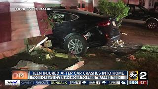 Teen rescued after car crashes into Aberdeen home