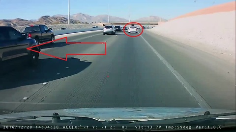 Reckless Driver Dangerously Cuts Lanes On A Busy Road