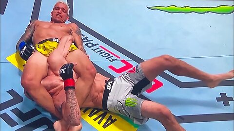 Did Tony Ferguson fight for 2 full rounds with a broken arm? Charles Oliveira arm bar looks tight