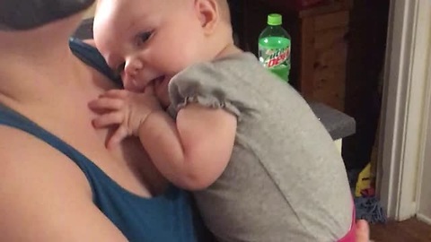 Baby Girl Doesn't Think Her Mom's Face Mask Is Doing Anything Good