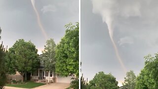 Crazy tornado footage taken right in front of this home