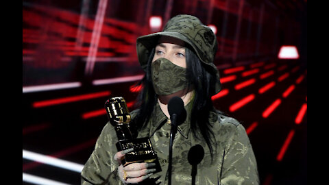 Billie Eilish wants people to wear their mask as she speaks at the Billboard Music Awards