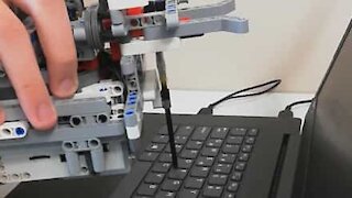 Kid creates useless robot to press F key